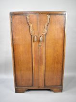 A Mid 20th Century Oak Fitted Gentleman's Wardrobe, 76cm wide