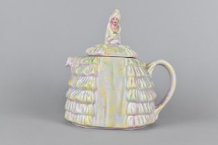 A 'Ye Daintee Ladyee' Teapot, Regd No. 824571, 18cm high