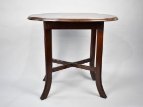 A Mid 20th Century Oval Topped Occasional table, 77cm Wide