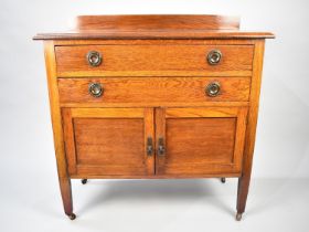 An Edwardian Oak Gallaried Sideboard with Two Long Drawers over Cupboard Base, 91cm Wide