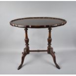A Mahogany Twin Pedestal Oval Topped Coffee Table, 60cm Wide and 43cm Deep