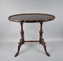 A Mahogany Twin Pedestal Oval Topped Coffee Table, 60cm Wide and 43cm Deep