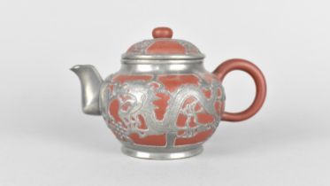 A Chinese Yixing and Pewter Mounted 'Tung King Shun Factory Weihaiwei' Teapot, Some Condition Issues