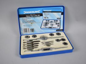 A Silver Lined Sixteen Piece Tap and Die Set, Complete