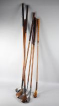 A Collection of Vintage and Modern Hickory Shafted Golf Clubs to Include Two Woods, Four Irons and