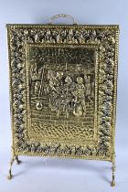 A Mid 20th Century Pressed Brass Fire Screen, Depicting Kitchen Scene, 40cm wide