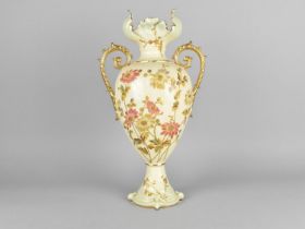 A Continental Twin Handled Blush Ivory Type Vase Hand Painted with Flowers and with Gilt