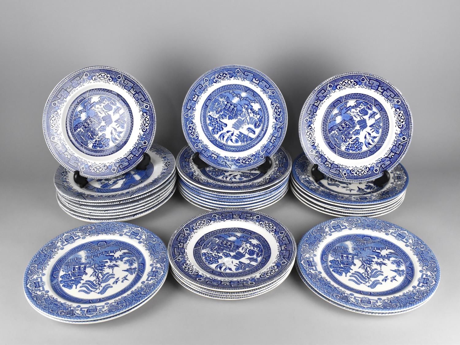 A Collection of Various Blue and White Willow Pattern Plates (34 Pieces)