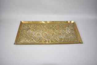 An Arts and Crafts Hand Beaten Rectangular Brass Tray with Fruit and Foliate Decoration, 55cmX27cm