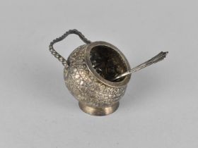 An Indian White Metal Helmet Shaped Salt with Repousse Decoration to Body and Loop Handle (41g)