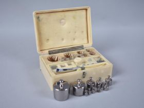 A Mid 20th Century Cased Set of Scientific Weights by Baird and Tatlock