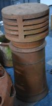 A Terracotta Chimney Pot with Terracotta Venting Cowl, 30cm Diameter and 69cm high