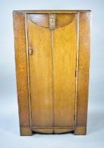 A Mid 20th Century Oak Fitted Gents Wardrobe, 75cm wide