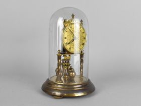 A Mid 20th Century Brass Pillar Clock by Hermle Under Glass Dome , 22cm High