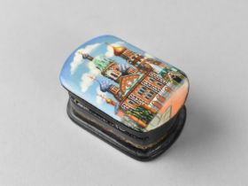 A Small Souvenir Russian Enamelled Box with Hinged Lid Decorated with the Kremlin, 5.5cm Long