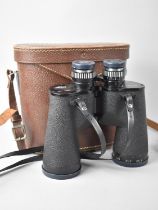 A Pair of Swift Newport 10X50 Binoculars in Leather Case