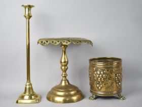 A Tall Brass Candlestick, 36cm high, a Late Victorian Pierced Trivet and a Later Brass Planter