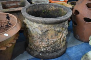 A Terracotta Circular Italian Style Planter Decorated in Relief with Cherubs, 46cm Diameter and 41cm