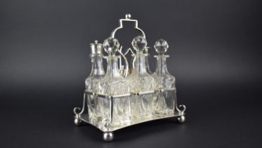 An Edwardian Silver Plated Six Bottle Cruet Set