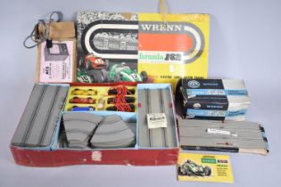 A Vintage Wrenn Formula 152 Triple Slot Racing Set with Extra Track Sections and Lap Counter