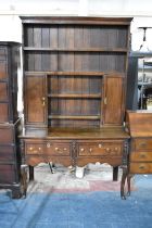 A 19th Century Two Drawer Oak Dresser with Shaped Apron, Cabriole Supports to Base and Four Shelf