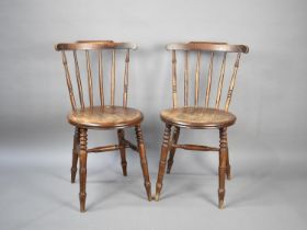 A Pair of Circular Seated Spindle Back Side Chairs