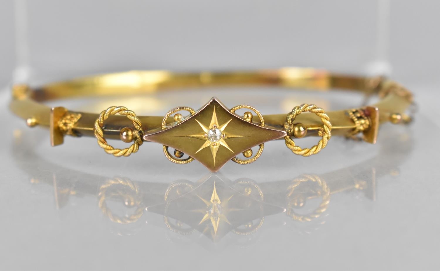 A Late 19th/Early 20th Century 9ct Gold Bracelet with Applied Design and Central Mounted Diamond, 6g