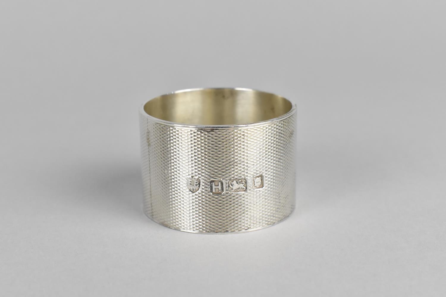 A Silver Napkin Ring by Edward Barnard & Sons Ltd, with Engine Turned Decoration (Not - Image 2 of 3