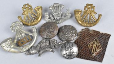 A Small Collection of Various Vintage Military Cap Badges