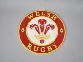 A Circular Cold Painted Cast Metal Rugby Sign for Wales, 23cms Diameter