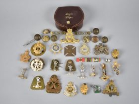 A Collection of Various Military Badges, Buttons Etc