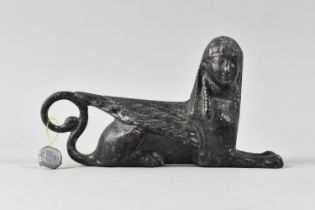 A Souvenir Cast Metal Egyptian Sphinx, 13cms Long