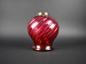 A Late Victorian Cranberry Glass Oil Lamp Reservoir Base with Wrythen Decoration, 18cms High