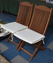 A Pair of Modern Folding Teak Garden Chairs