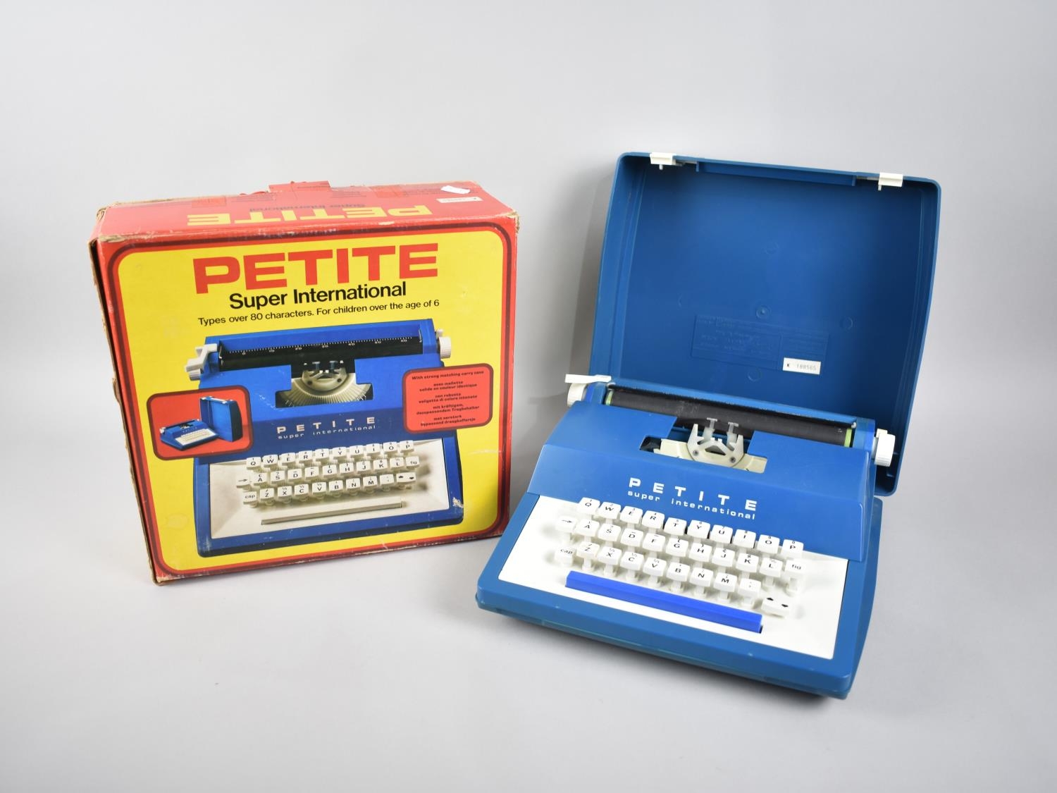 A Vintage Boxed Petite Super International Toy Typewriter, Original Box