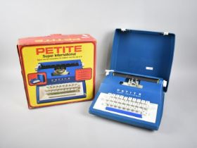 A Vintage Boxed Petite Super International Toy Typewriter, Original Box