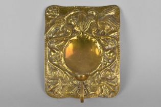 A 19th Century French Brass Wall Hanging Candle Holder with Relief Back Reflector Decorated with