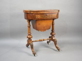 A Late Victorian Inlaid Walnut Lift and Twist Top Games Work Table with Pull Out Wool Slide, Inner