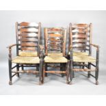 A Set of Six Harlequin Rush Seated Ladder Back Dining Chairs, Some with Condition issues and Carvers