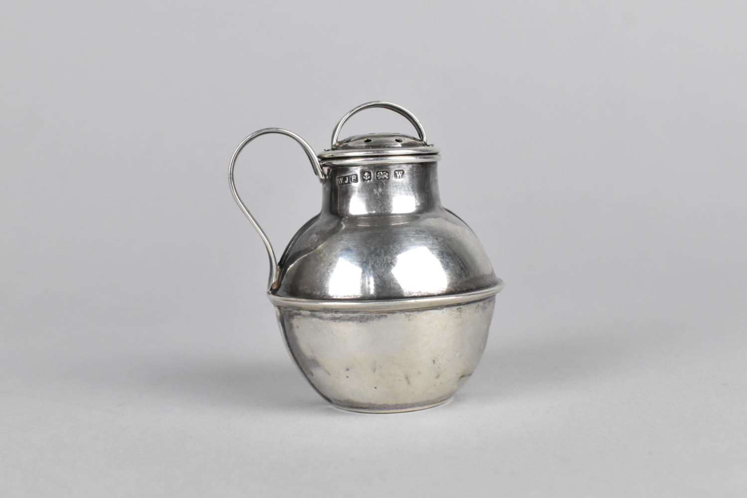 A Silver Pepperette in the Form of a Jersey Cream Jug by William J Holmes, Birmingham 1921 Hallmark,