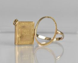 A 9ct Gold Ring Mount and a Holy Bible Pendant