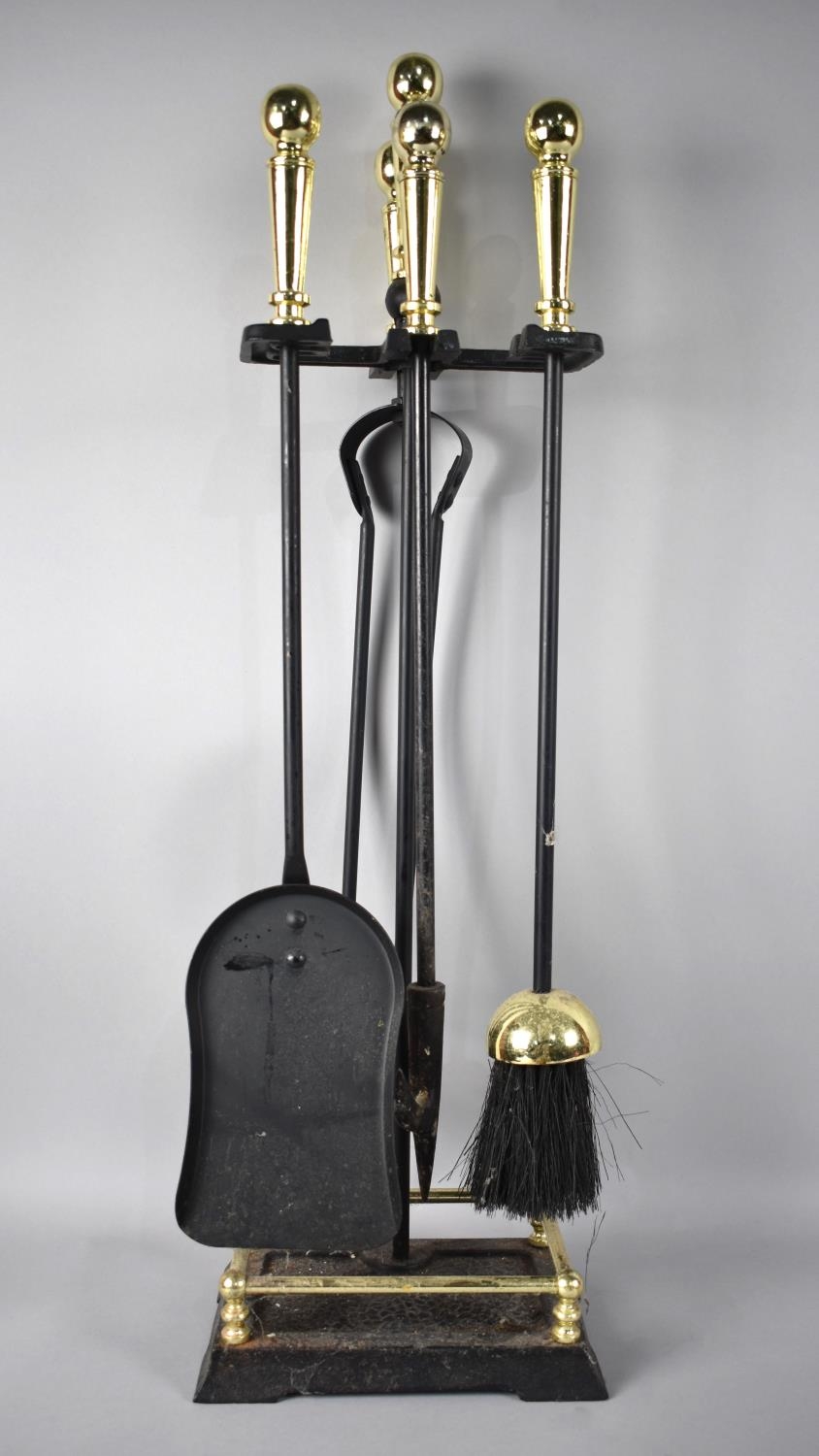 A Modern Brass Mounted Iron Long Handled Fire Companion Set, 65cms High