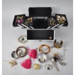 A Modern Cantilevered Jewellery box Containing Costume Jewellery