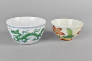 Two Chinese Porcelain Tea Bowls, the Smaller Example Decorated with Flowers and the Larger with