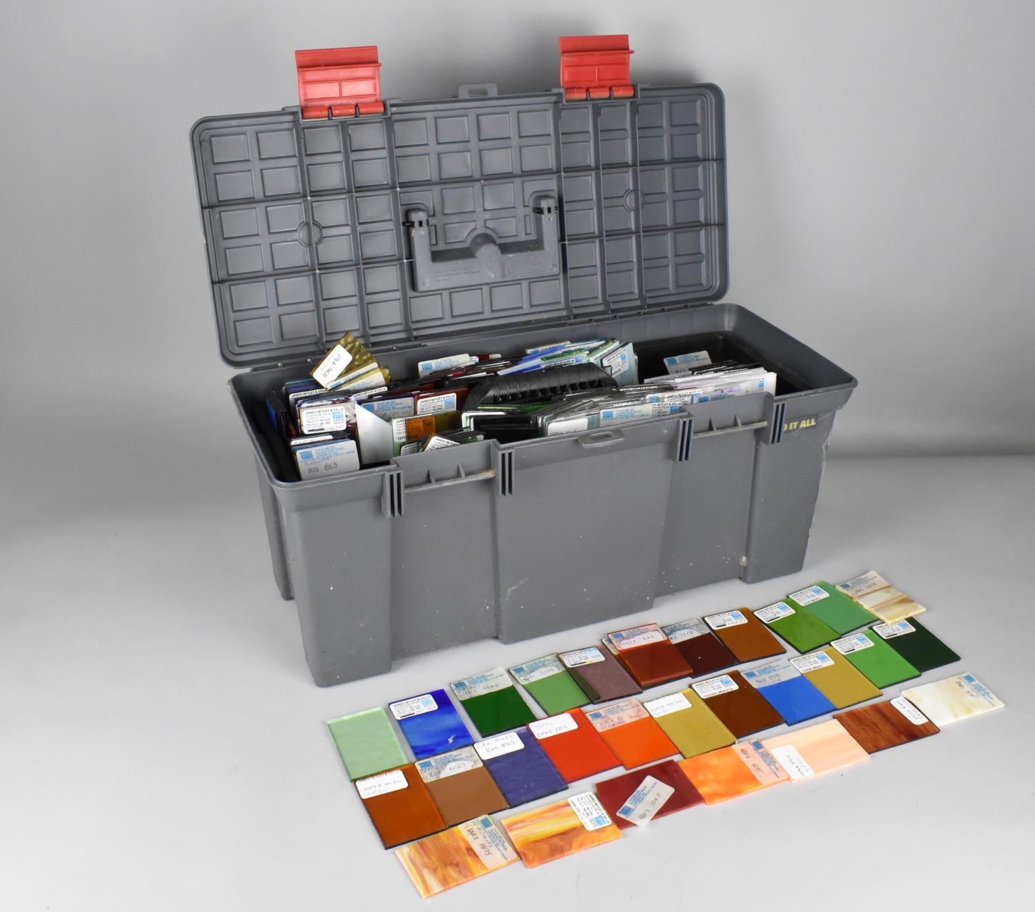 A Tool Box Containing Large Quantity of Coloured Glass Samples