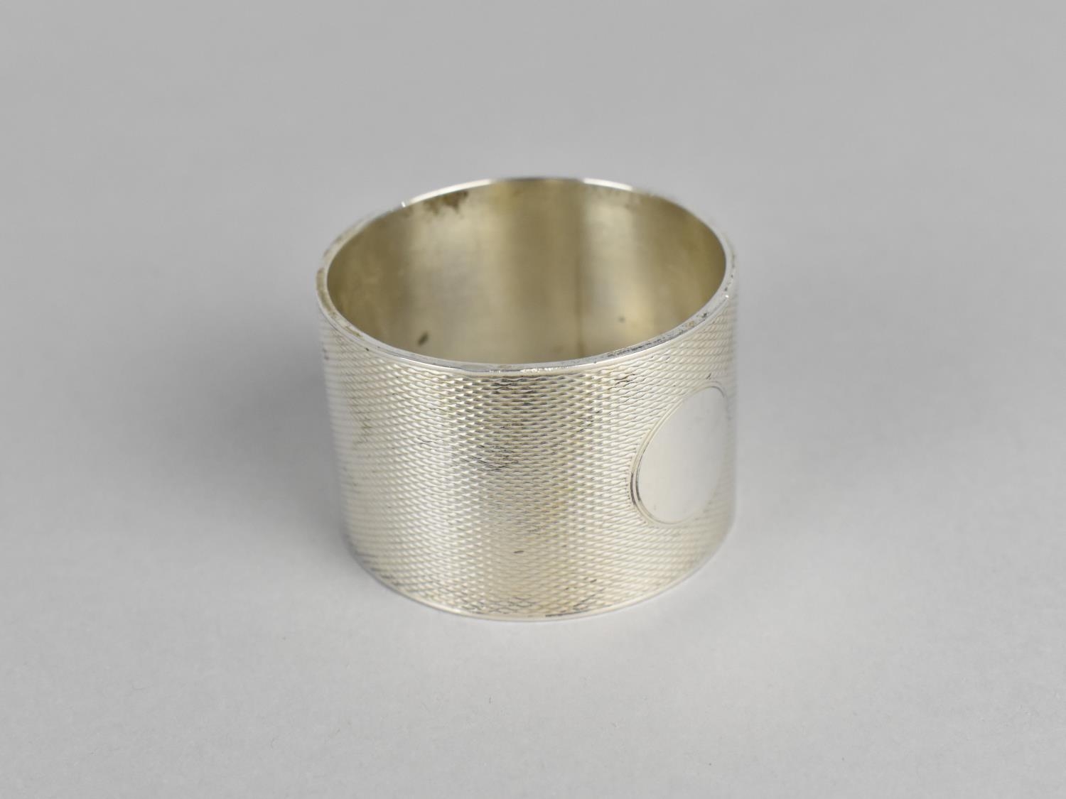 A Silver Napkin Ring by Edward Barnard & Sons Ltd, with Engine Turned Decoration (Not - Image 3 of 3