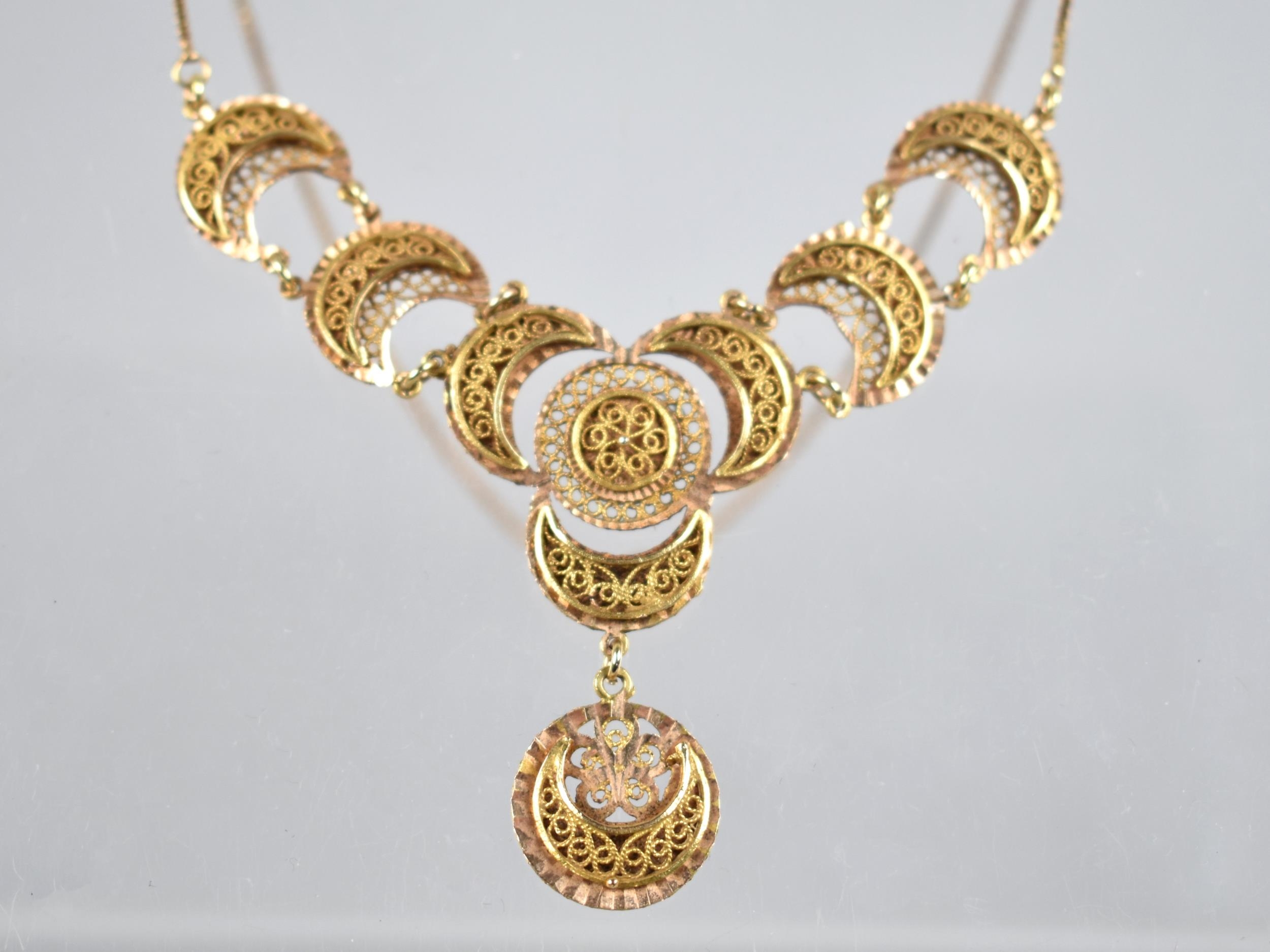 A Two Tone Gold Metal Filigree Necklace Comprising Crescents Raised on Textured Plaques, Each 16mm