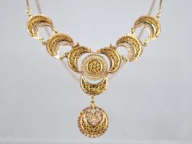 A Two Tone Gold Metal Filigree Necklace Comprising Crescents Raised on Textured Plaques, Each 16mm