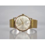 A 9ct Gold Benson Gents Wrist Watch, Satin Champagne Dial with Gold Baton Hands and Baton Hour