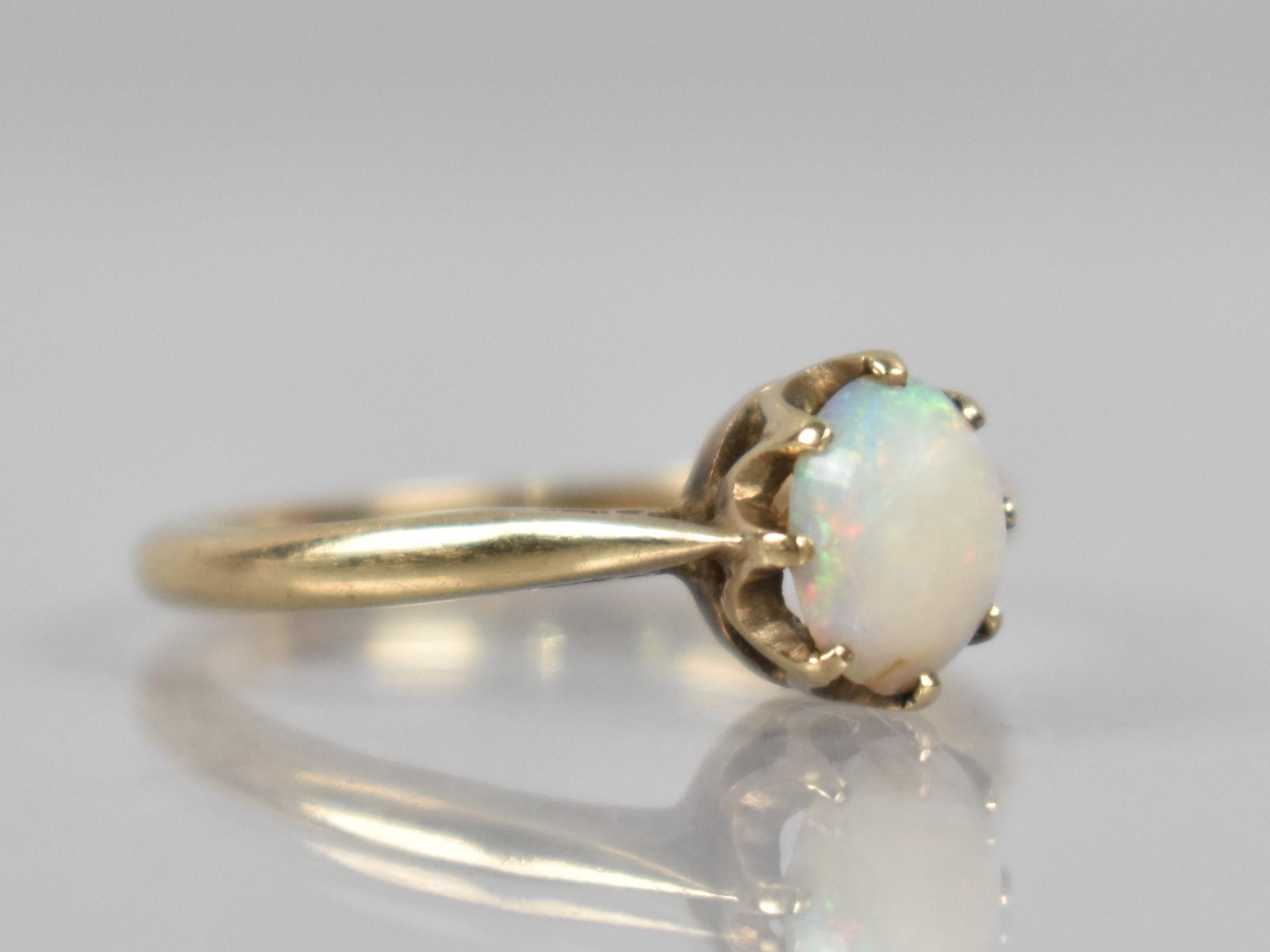 A 9ct Gold Opal Mounted Ring, Oval Cabochon Stone 7.2mm by 5.5mm, Raised in Eight Claws to Reverse - Image 4 of 4